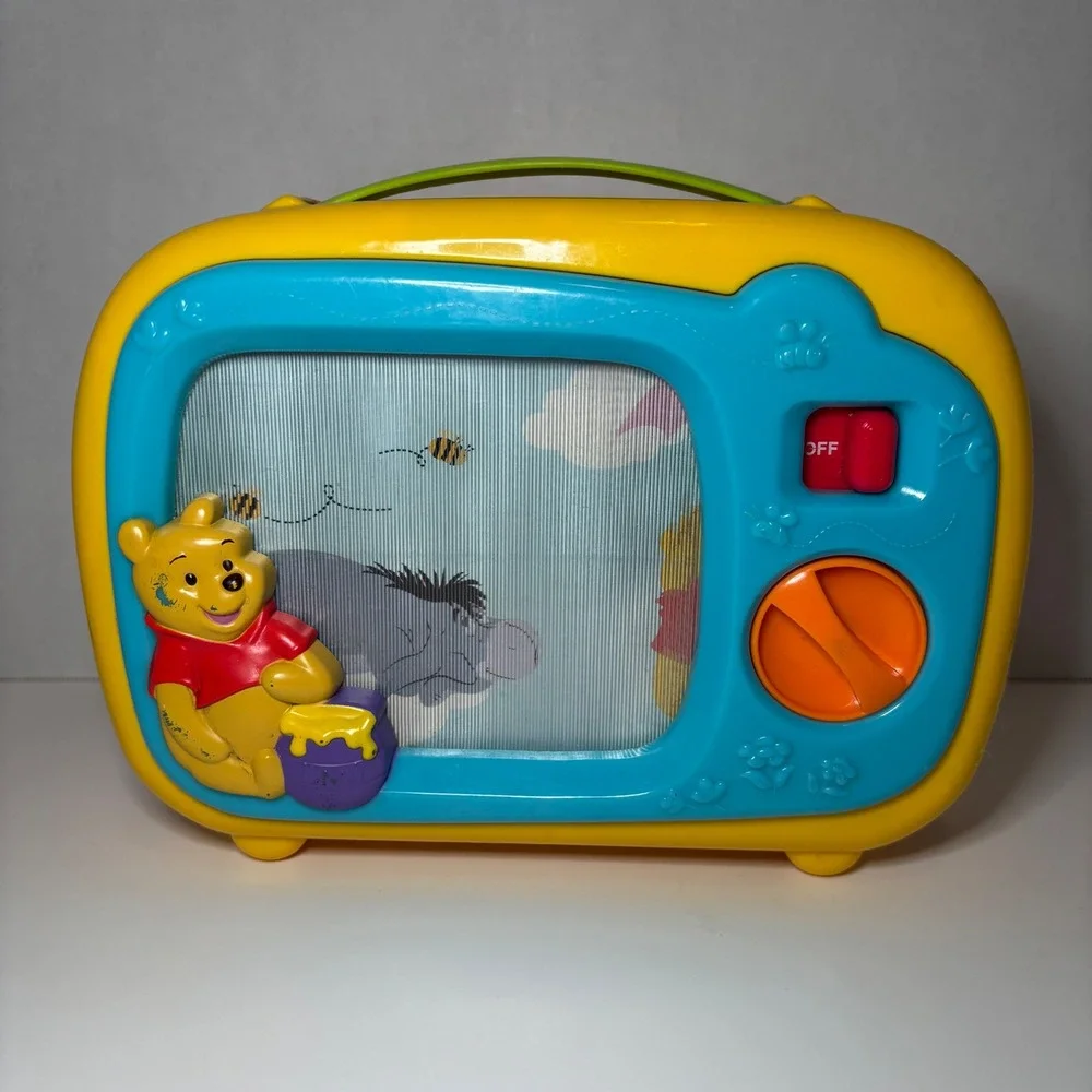 Disney Winnie the Pooh Musical Wind Up Toy TV Scrolling Screen Eeyore Yellow